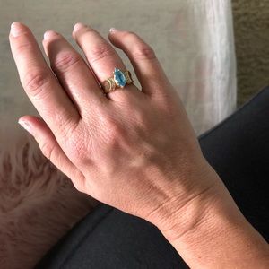 Blue topaz and diamond ring